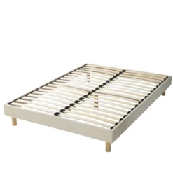 Lit tissu beige avec tête de lit bouclette