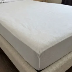 Protège matelas bouclette imperméable - bonnet jusqu'à 27 cm
