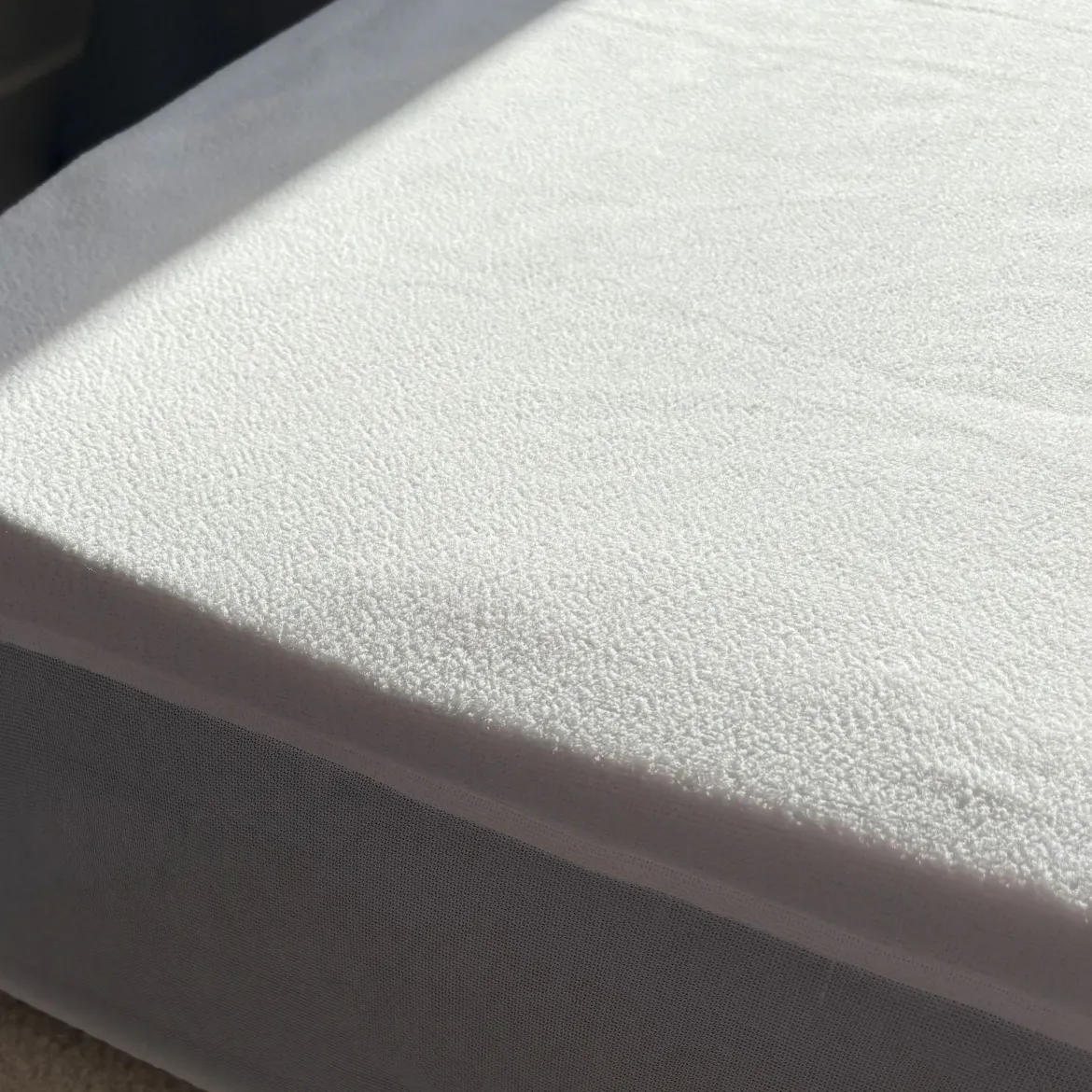 Protège matelas bouclette imperméable - bonnet jusqu'à 27 cm